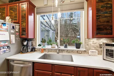 Kitchen - 20143 Riverside Dr # 4A, Eagle River, AK 99577 photo 4 of 7