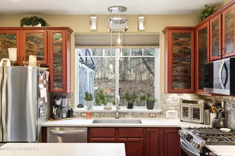 Kitchen - 20143 Riverside Dr # 4A, Eagle River, AK 99577 photo 5 of 7