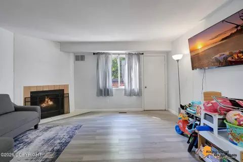Living - 4101 E 20th Ave # A-4, Anchorage, AK 99508 photo 1 of 2