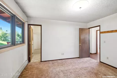Bedroom - 5836 E 9th Ct, Anchorage, AK 99504 photo 3 of 6