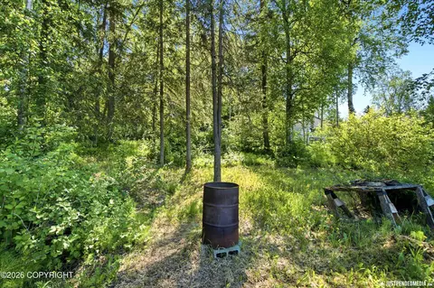 Exterior - 5836 E 9th Ct, Anchorage, AK 99504 photo 7 of 9