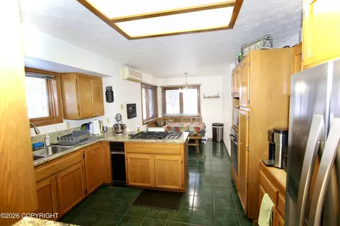 Kitchen - 22939 Eagle Glacier Loop, Eagle River, AK 99577 photo 2 of 2
