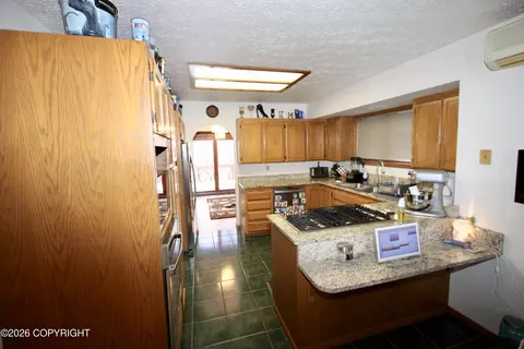 Kitchen - 22939 Eagle Glacier Loop, Eagle River, AK 99577 photo 1 of 2