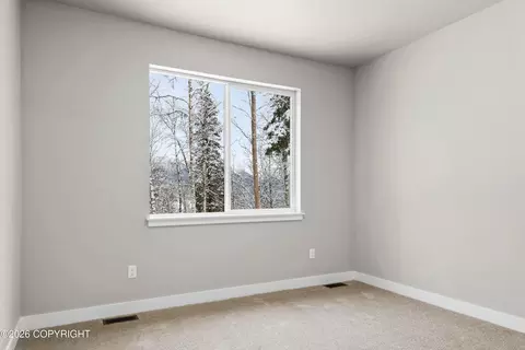Bedroom - 8811 Turlock Dr, Eagle River, AK 99577 photo 3 of 7