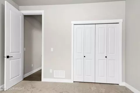 Bedroom - 8811 Turlock Dr, Eagle River, AK 99577 photo 4 of 7