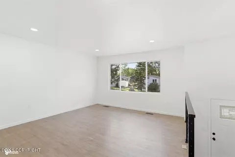 Living - 3850 E 84th Ave, Anchorage, AK 99507 photo 6 of 8