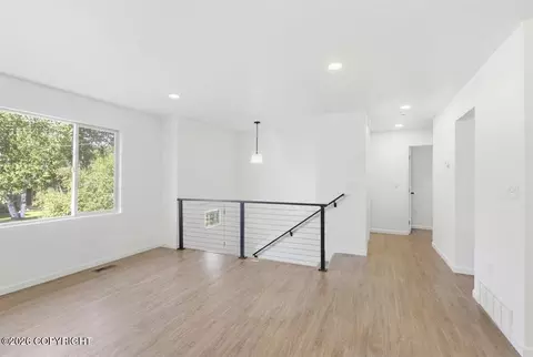 Living - 3850 E 84th Ave, Anchorage, AK 99507 photo 5 of 8
