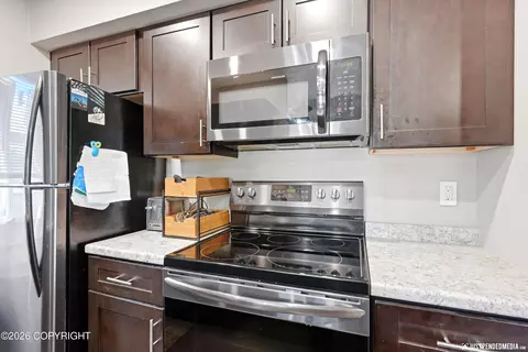 Kitchen - 4345 Constellation Ave # 16, Anchorage, AK 99517 photo 1 of 2