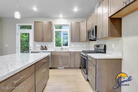 Kitchen - 12239 Vista Ridge Loop # 13, Eagle River, AK 99577 photo 4 of 5