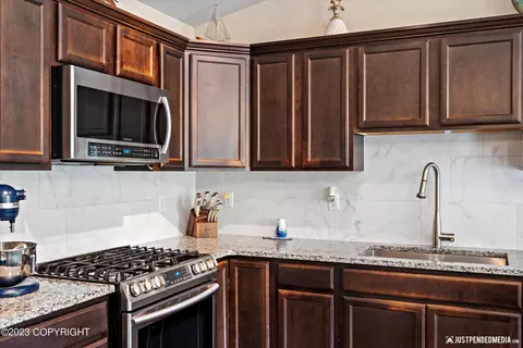 Kitchen - 21040 Trailhead Ave # 25, Eagle River, AK 99577 photo 4 of 4