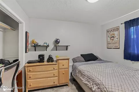 Bedroom - 18713 N Lowrie Loop, Eagle River, AK 99577 photo 4 of 7