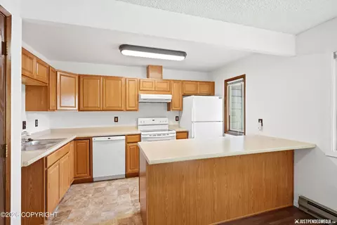 Kitchen - 9596 Canton Loop # 184, Anchorage, AK 99515 photo 1 of 3