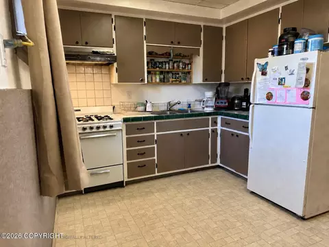 Kitchen - 4447 E 6th Ave, Anchorage, AK 99508 photo 4 of 4