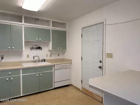 Kitchen - 4447 E 6th Ave, Anchorage, AK 99508 photo 2 of 4