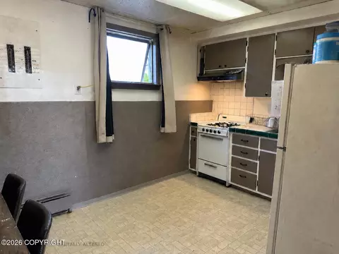 Kitchen - 4447 E 6th Ave, Anchorage, AK 99508 photo 3 of 4