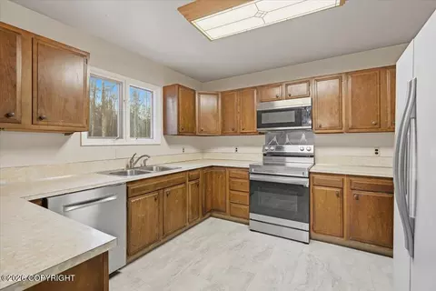 Kitchen - 21928 Birchwood Loop Rd, Chugiak, AK 99567 photo 3 of 4