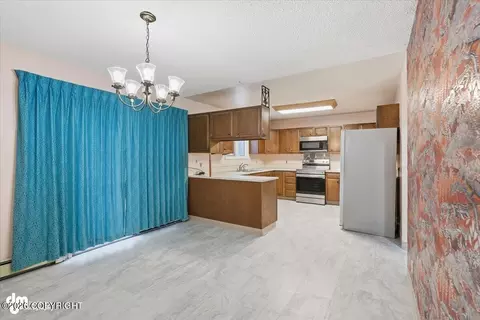 Dining - 21928 Birchwood Loop Rd, Chugiak, AK 99567 photo 1 of 4