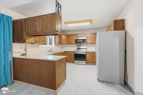 Kitchen - 21928 Birchwood Loop Rd, Chugiak, AK 99567 photo 2 of 4