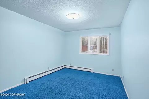 Bedroom - 21928 Birchwood Loop Rd, Chugiak, AK 99567 photo 5 of 6
