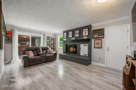 Living - 11048 Buskin Cir, Eagle River, AK 99577 photo 3 of 4