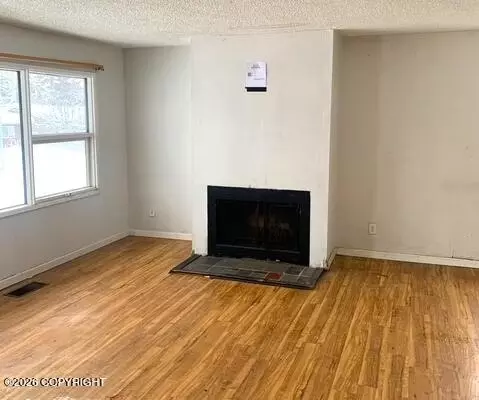 Living - 4410 E 5th Ave, Anchorage, AK 99508 photo 1 of 1
