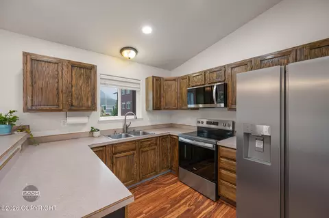 Kitchen - 12121 Winter Park Pl, Eagle River, AK 99577 photo 2 of 5