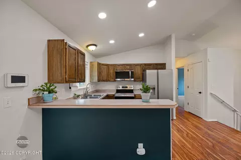 Kitchen - 12121 Winter Park Pl, Eagle River, AK 99577 photo 5 of 5