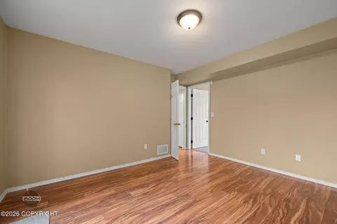 Bedroom - 12121 Winter Park Pl, Eagle River, AK 99577 photo 5 of 7