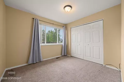 Bedroom - 12121 Winter Park Pl, Eagle River, AK 99577 photo 6 of 7
