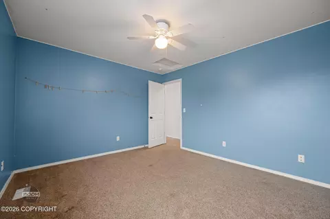Bedroom - 12121 Winter Park Pl, Eagle River, AK 99577 photo 3 of 7