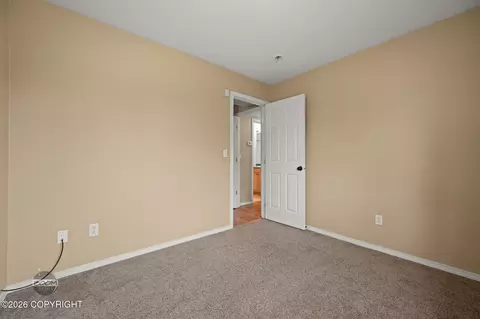 Bedroom - 12121 Winter Park Pl, Eagle River, AK 99577 photo 7 of 7