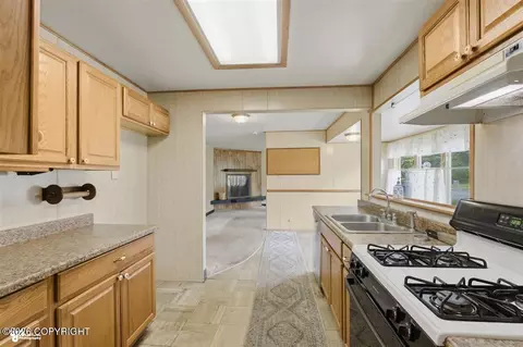 Kitchen - 2389 E 47th Ct, Anchorage, AK 99507 photo 1 of 4