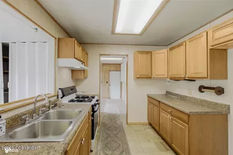 Kitchen - 2389 E 47th Ct, Anchorage, AK 99507 photo 4 of 4