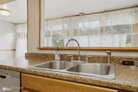 Kitchen - 2389 E 47th Ct, Anchorage, AK 99507 photo 2 of 4