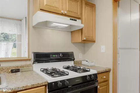 Kitchen - 2389 E 47th Ct, Anchorage, AK 99507 photo 3 of 4