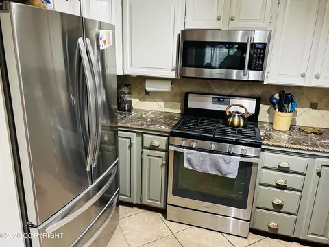 Kitchen - 23627 Dolly Ave, Chugiak, AK 99567 photo 2 of 3