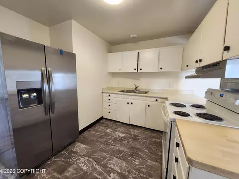 Kitchen - 3925 E 9th Ave, Anchorage, AK 99508 photo 4 of 6