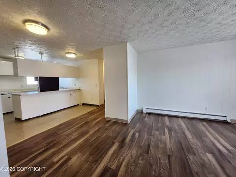 Living - 3925 E 9th Ave, Anchorage, AK 99508 photo 6 of 7