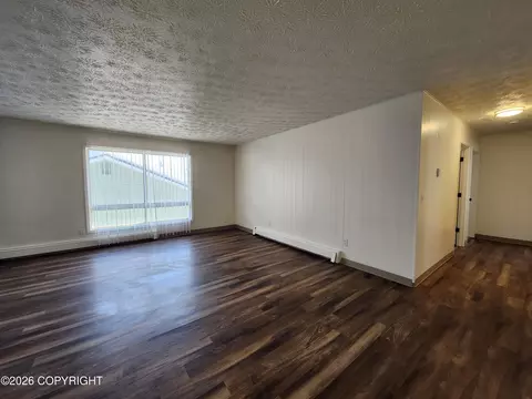 Living - 3925 E 9th Ave, Anchorage, AK 99508 photo 4 of 7