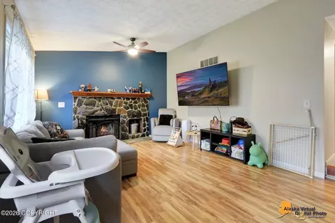 Living - 16306 Killington Ct, Eagle River, AK 99577 photo 3 of 4