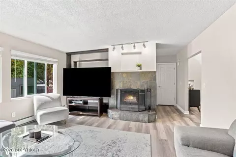 Living - 3151 Draco Dr, Anchorage, AK 99502 photo 3 of 4