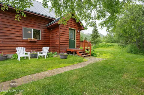 Exterior - 1451 W River Dr, Eagle River, AK 99577 photo 4 of 14