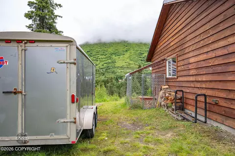 Exterior - 1451 W River Dr, Eagle River, AK 99577 photo 13 of 14