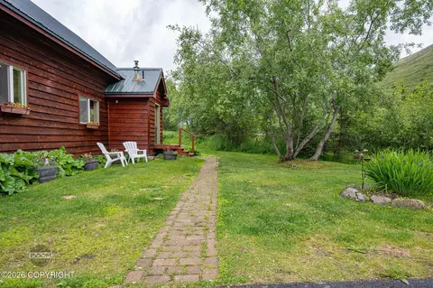 Exterior - 1451 W River Dr, Eagle River, AK 99577 photo 3 of 14