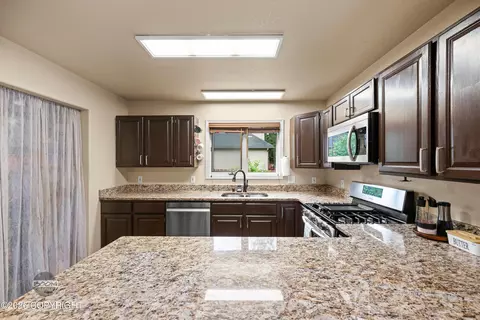 Kitchen - 10036 Caribou St, Eagle River, AK 99577 photo 2 of 7