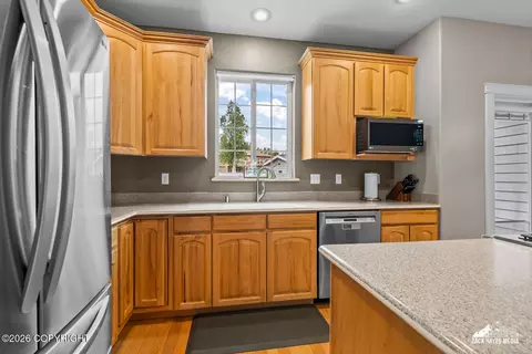 Kitchen - 2233 E Klatt Rd, Anchorage, AK 99516 photo 4 of 7