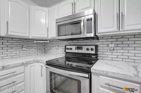 Kitchen - 5624 Alora Loop # 49, Anchorage, AK 99504 photo 5 of 6