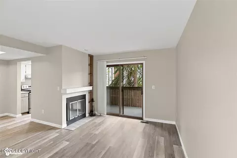 Living - 450 E 56th Ave # 3B, Anchorage, AK 99518 photo 1 of 2