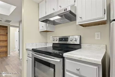 Kitchen - 450 E 56th Ave # 3B, Anchorage, AK 99518 photo 3 of 3