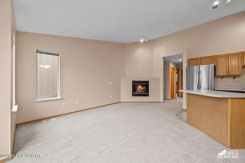 Living - 205 Dailey Ave # 2, Anchorage, AK 99515 photo 2 of 2